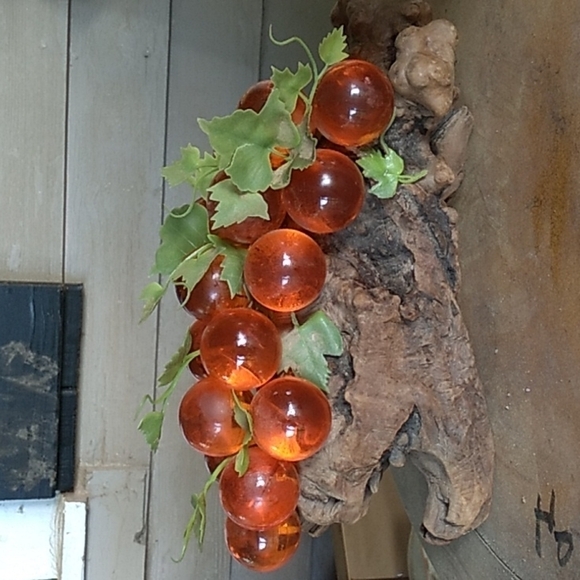Vintage 1970s large orange lucien grapes on driftwood